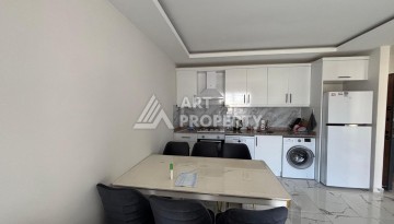 Апартаменты 1+1 с видом на море в районе Каргыджак, всего в 250 метрах от пляжа. - Ракурс 8