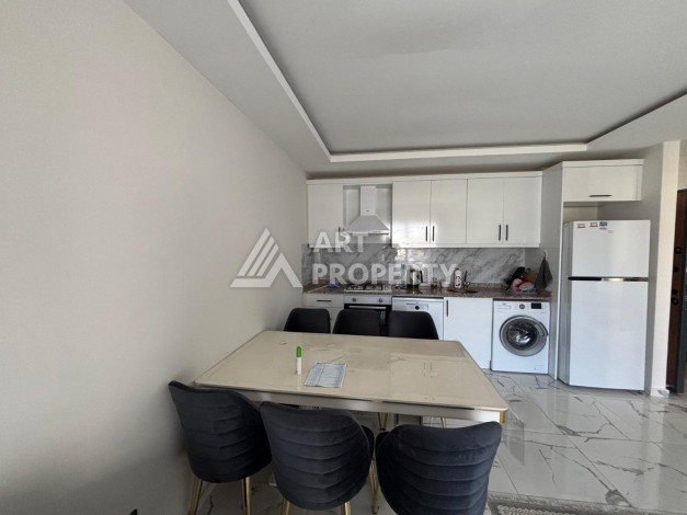 Апартаменты 1+1 с видом на море в районе Каргыджак, всего в 250 метрах от пляжа. - Ракурс 7