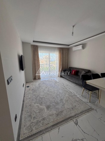 Апартаменты 1+1 с видом на море в районе Каргыджак, всего в 250 метрах от пляжа. - Ракурс 8