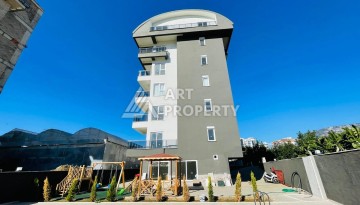 Апартаменты 1+1 с видом на море в районе Каргыджак, всего в 250 метрах от пляжа. - Ракурс 11