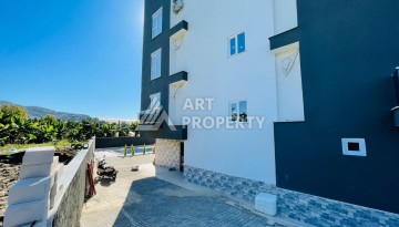 Апартаменты 1+1 с видом на море в районе Каргыджак, всего в 250 метрах от пляжа. - Ракурс 12