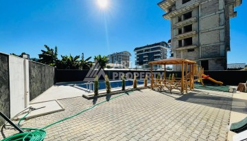 Апартаменты 1+1 с видом на море в районе Каргыджак, всего в 250 метрах от пляжа. - Ракурс 14