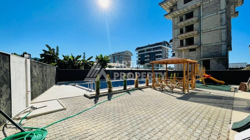 Апартаменты 1+1 с видом на море в районе Каргыджак, всего в 250 метрах от пляжа. - Ракурс 13