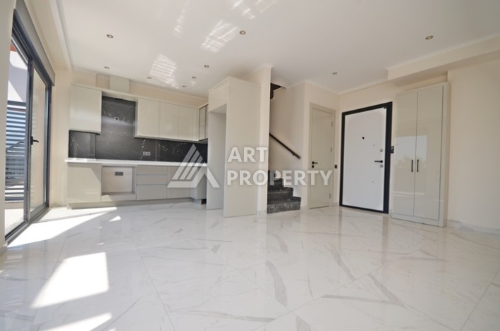 Садовый дуплекс  2+1 в современном комплексе, район Демирташ. - Ракурс 1