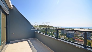 Двухуровневые апартаменты 2+1 с панорамным видом на горы и море, в современном комплексе в районе Демирташ. - Ракурс 1