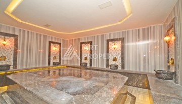 Двухуровневые апартаменты 2+1 с панорамным видом на горы и море, в современном комплексе в районе Демирташ. - Ракурс 17
