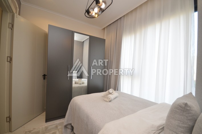 Апартаменты 2+1 с видом на море и горы в комплексе с полной рабочей инфраструктурой, район Демирташ. - Ракурс 4