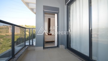 Апартаменты 2+1 с видом на море и горы в комплексе с полной рабочей инфраструктурой, район Демирташ. - Ракурс 9