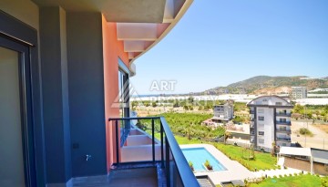 Апартаменты 2+1 с видом на море и горы в комплексе с полной рабочей инфраструктурой, район Демирташ. - Ракурс 10