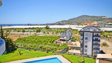 Апартаменты 2+1 с видом на море и горы в комплексе с полной рабочей инфраструктурой, район Демирташ. - Ракурс 26