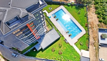 Апартаменты 2+1 с видом на море и горы в комплексе с полной рабочей инфраструктурой, район Демирташ. - Ракурс 28