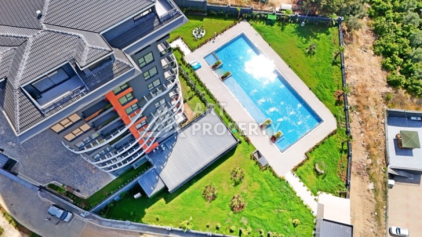 Апартаменты 2+1 с видом на море и горы в комплексе с полной рабочей инфраструктурой, район Демирташ. - Ракурс 27