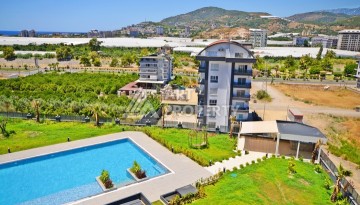 Апартаменты 2+1 с видом на море и горы в комплексе с полной рабочей инфраструктурой, район Демирташ. - Ракурс 32