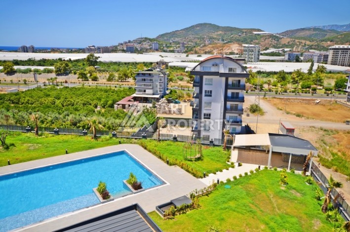 Апартаменты 2+1 с видом на море и горы в комплексе с полной рабочей инфраструктурой, район Демирташ. - Ракурс 31