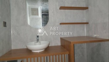 Просторная квартира 1+1 в Арпачбахшиш, Мерсин, 60 кв.м. - Ракурс 4