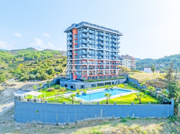 Современная квартира 2+1 с видоми на горы, море и город в современном комплексе Демирташ. - Ракурс 0