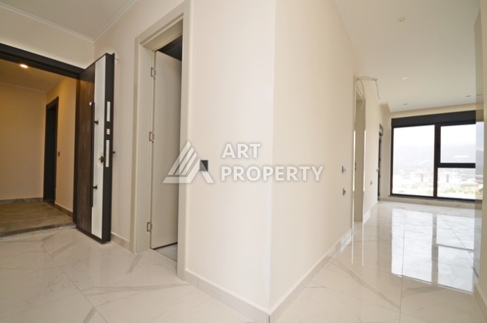 Современная квартира 2+1 с видоми на горы, море и город в современном комплексе Демирташ. - Ракурс 2