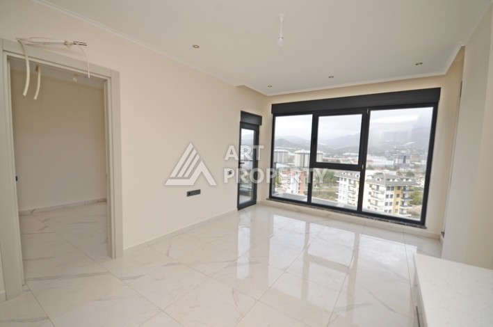 Современная квартира 2+1 с видоми на горы, море и город в современном комплексе Демирташ. - Ракурс 3