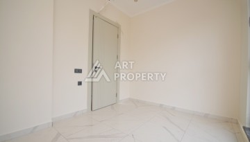 Современная квартира 2+1 с видоми на горы, море и город в современном комплексе Демирташ. - Ракурс 7