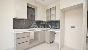 Современная квартира 2+1 с видоми на горы, море и город в современном комплексе Демирташ. - Ракурс 9