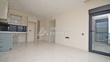 Современная квартира 2+1 с видоми на горы, море и город в современном комплексе Демирташ. - Ракурс 10