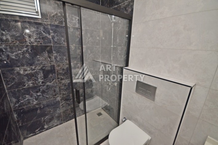 Современная квартира 2+1 с видоми на горы, море и город в современном комплексе Демирташ. - Ракурс 10