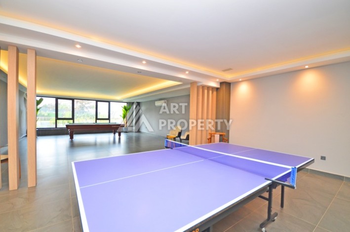 Современная квартира 2+1 с видоми на горы, море и город в современном комплексе Демирташ. - Ракурс 13