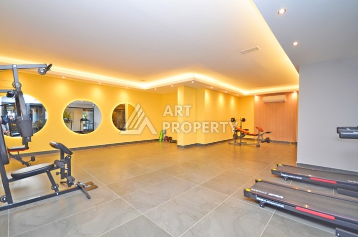 Современная квартира 2+1 с видоми на горы, море и город в современном комплексе Демирташ. - Ракурс 21