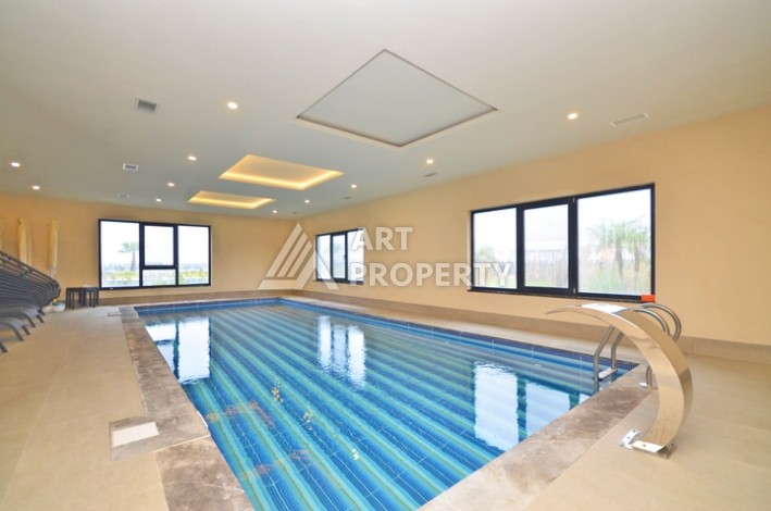 Современная квартира 2+1 с видоми на горы, море и город в современном комплексе Демирташ. - Ракурс 24