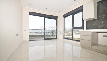 Уютная квартира 1+1 с потрясающим видом на море и город в современном комплексе в районе Демирташ. - Ракурс 1