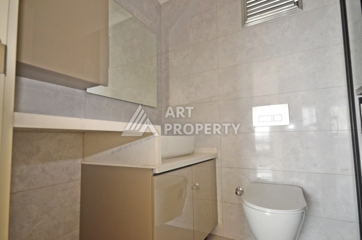 Уютная квартира 1+1 с потрясающим видом на море и город в современном комплексе в районе Демирташ. - Ракурс 2