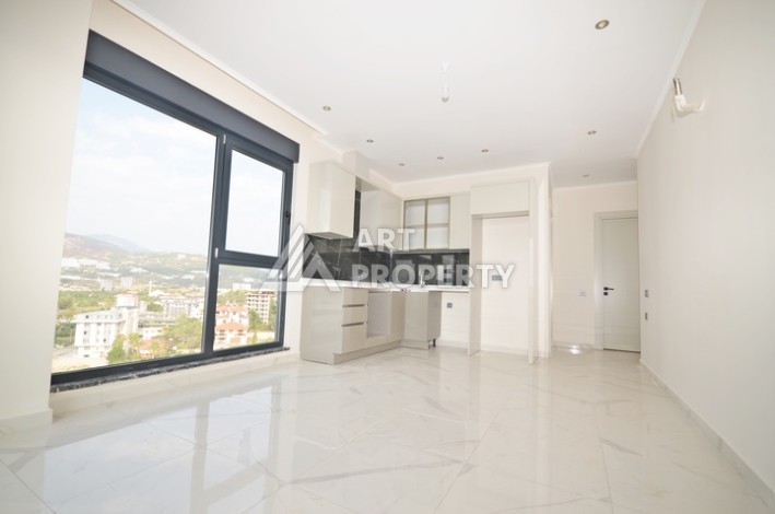 Уютная квартира 1+1 с потрясающим видом на море и город в современном комплексе в районе Демирташ. - Ракурс 3