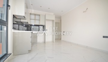 Уютная квартира 1+1 с потрясающим видом на море и город в современном комплексе в районе Демирташ. - Ракурс 5