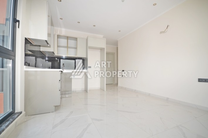 Уютная квартира 1+1 с потрясающим видом на море и город в современном комплексе в районе Демирташ. - Ракурс 4