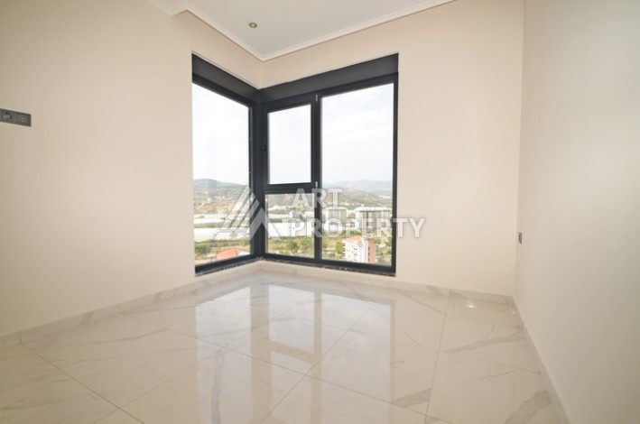 Уютная квартира 1+1 с потрясающим видом на море и город в современном комплексе в районе Демирташ. - Ракурс 5