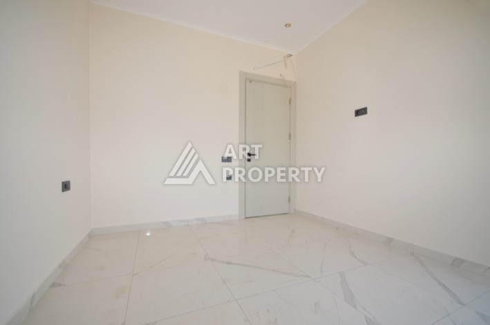 Уютная квартира 1+1 с потрясающим видом на море и город в современном комплексе в районе Демирташ. - Ракурс 6