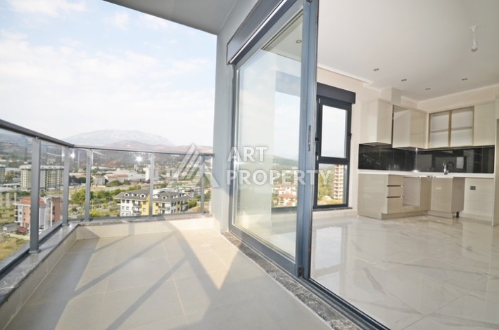 Уютная квартира 1+1 с потрясающим видом на море и город в современном комплексе в районе Демирташ. - Ракурс 8