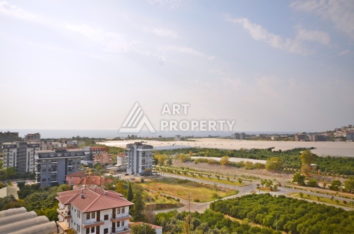 Уютная квартира 1+1 с потрясающим видом на море и город в современном комплексе в районе Демирташ. - Ракурс 9