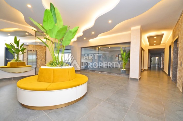 Уютная квартира 1+1 с потрясающим видом на море и город в современном комплексе в районе Демирташ. - Ракурс 15