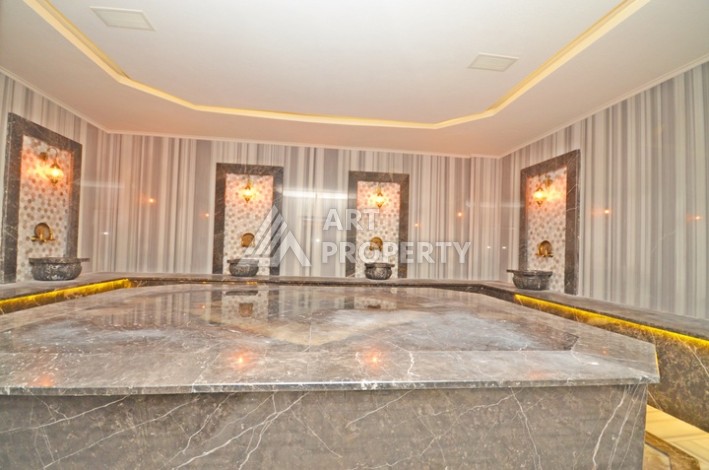 Уютная квартира 1+1 с потрясающим видом на море и город в современном комплексе в районе Демирташ. - Ракурс 17