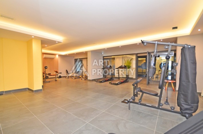 Уютная квартира 1+1 с потрясающим видом на море и город в современном комплексе в районе Демирташ. - Ракурс 21