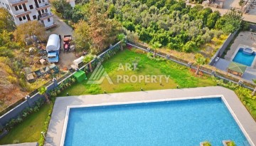 Уютная квартира 1+1 с потрясающим видом на море и город в современном комплексе в районе Демирташ. - Ракурс 25