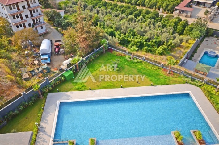 Уютная квартира 1+1 с потрясающим видом на море и город в современном комплексе в районе Демирташ. - Ракурс 24