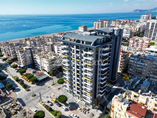 Стильная квартира 2+1 в новом комплексе всего в 150 метрах от моря в районе Махмутлар. - Ракурс 0