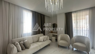 Стильная квартира 2+1 в новом комплексе всего в 150 метрах от моря в районе Махмутлар. - Ракурс 6