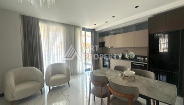 Стильная квартира 2+1 в новом комплексе всего в 150 метрах от моря в районе Махмутлар. - Ракурс 7