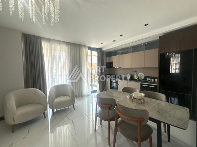 Стильная квартира 2+1 в новом комплексе всего в 150 метрах от моря в районе Махмутлар. - Ракурс 6