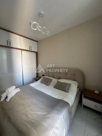 Стильная квартира 2+1 в новом комплексе всего в 150 метрах от моря в районе Махмутлар. - Ракурс 9