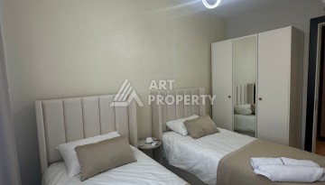 Стильная квартира 2+1 в новом комплексе всего в 150 метрах от моря в районе Махмутлар. - Ракурс 11