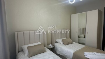 Стильная квартира 2+1 в новом комплексе всего в 150 метрах от моря в районе Махмутлар. - Ракурс 12